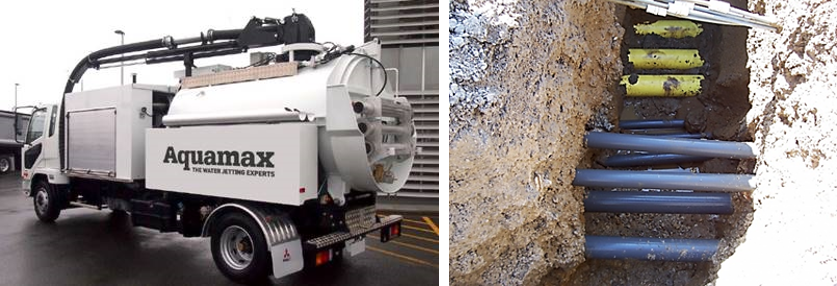 Vacuum excavation truck and example showing hydro excavators having removed concrete around cables